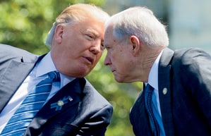 US President Donald Trump speaks with Attorney General Jeff Sessions (R) during the 36th Annual National Peace Officers Memorial Service at the US Capitol in Washington, DC, May 15, 2017.