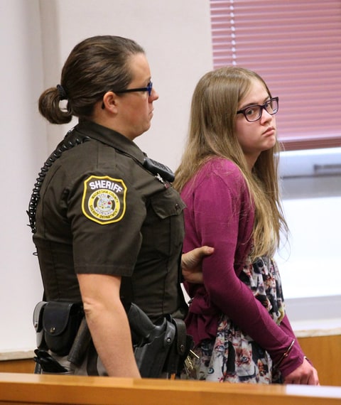 Morgan Geyser is brought into court by a sheriff's deputy on Aug. 21, 2015 during the arraignment of the Slenderman stabbing trial in Waukesha County Court in Waukesha, Wis.