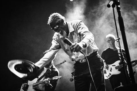 Robert Finley (center) and Dave Roe (R) perform with Dan Auerbach and the Easy Eye Sound Revue perform at the Wiltern in Los Angeles on February 17th, 2018.