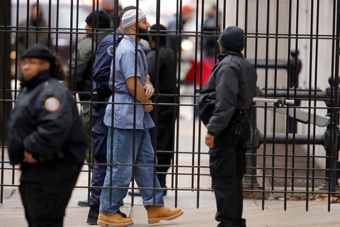 Adnan Syed (C) arrives at the Baltimore City Circuit Courthouse in Baltimore, Maryland February 5, 2016. Syed, 35, was convicted in 2000 of kidnapping and strangling his ex-girlfriend Hae Min Lee, 18, and is serving a life sentence.