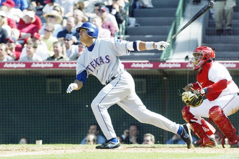 Alex Rodriguez #3 of the Texas Rangers hits his 300th career home run during the fifth inning of the game against the Anaheim Angels at Edison Field on April 2, 2003 in Anaheim, California. (