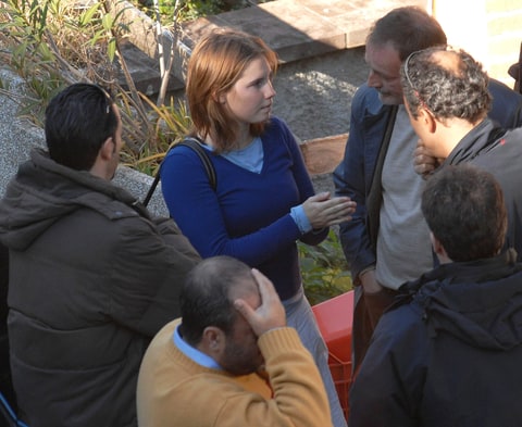 Amanda Knox at crime scene with Police