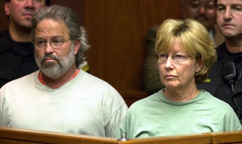 Former Symbionese Liberation Army members Bill Harris, left, and ex-wife Emily Harris, right, listen as charges were read against them in Sacramento (Calif.) Superior Court, Friday, Jan. 18, 2002, during their arraignment in the 1975 shooting death of a woman during a bank robbery.