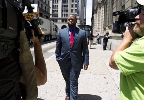 Baltimore police Officer William Porter, one of six Baltimore city police officers charged in connection to the death of Freddie Gray, leaves the courthouse, after testifying in the trial of Officer Caesar Goodson, Monday, June 13, 2016, in Baltimore Md. Porter's trial in the Gray case ended in mistrial. He will be tried again in September.