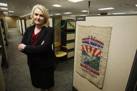 Jan. 19, 2017, Lori Ajax, chief of California's Bureau of Medical Cannabis Regulation, poses in the bureau's office in Sacramento, Calif. Ajax, and her staff are crafting regulations and rules that will govern the state's emerging legal pot mark, from where and how plants can be grown to setting guidelines to track the buds from fields to storefront.