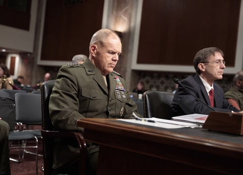 Marine Gen. Robert B. Neller, the commandant of the Marine Corps, and Acting Secretary Of The Navy Sean J. Stackley, right, wait to testify before the Senate Armed Services Committee on the investigation of nude photographs of female Marines and other women that were shared on the Facebook page