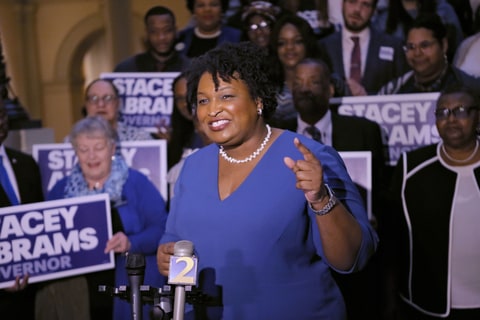 Stacey Abrams holds a news conference to announce she has qualified to run for governor, Tuesday, March 6, 2018 in Atlanta.