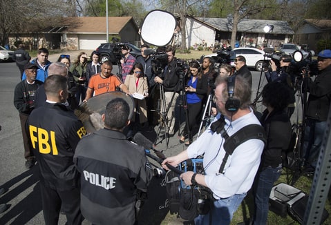 Authorities speak to the media after multiple explosions in Austin on Monday, March 12, 2018. Police are responding to another explosion Monday, that badly injured a woman, hours after a package bomb killed a teenager and wounded a woman in a different part of the city.