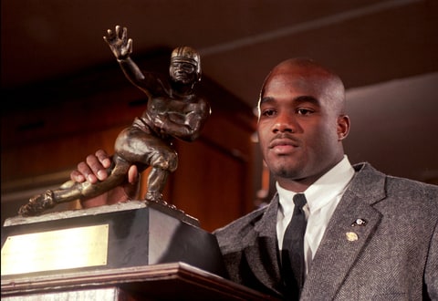 Colorado's Rashaan Salaam poses with the 1994 Heisman Trophy which he was awarded Saturday, Dec. 10, 1994, at the Downtown Athletic Club in New York