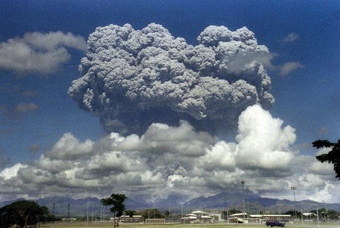 A giant mushroom cloud of steam and ash exploded out of Mount Pinatubo volcano during its June 1991 eruption in the Philippines, which killed more than 1,500 people and sent a cloud of ash into the atmosphere cooling world temperatures for years.