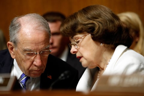 In this photo taken July 12, 2017, Senate Judiciary Committee Chairman Sen. Chuck Grassley, R-Iowa, talks with the Committee's ranking member Sen. Dianne Feinstein, D-Calif., on Capitol Hill in Washington. Glenn Simpson, the co-founder of a Washington opposition research firm that produced a dossier of salacious allegations involving President Donald Trump is to be interviewed by the Senate Judiciary Committee next week.