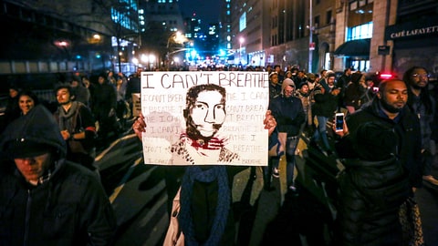 NEW YORK, NY - DECEMBER 04: Hundreds of protestors gather at Foley Square in New York, United States on December 04, 2014. A Staten Island grand jury voted against criminal charges for New York City Police a white police officer Daniel Pantaleo who was accused of using a chokehold during an arrest of Eric Garner. (Photo by Cem Ozdel/Anadolu Agency/Getty Images)