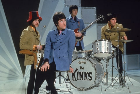 The Kinks, (L-R) Dave Davies, Ray Davies, Peter Quaife, and Mick Avory, wait on the set of a television show, ready to perform, 1968.