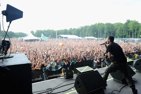 Rapper Logic performs onstage during day 2 of the Firefly Music Festival on June 19, 2015 in Dover, Delaware.