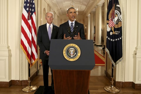 President Barack Obama, standing with Vice President Joe Biden, conducts a press conference in the East Room of the White House in response to the Iran Nuclear Deal, on July 14, 2015 in Washington, DC. The landmark deal will limit Iran's nuclear program in exchange for relief from international sanctions. The agreement, which comes after almost two years of diplomacy, has also been praised by Iranian President Hassan Rouhani.