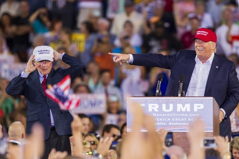 U.S. Republican presidential candidate Donald Trump introduces Alabama Senator Jeff Sessions (R) Mobile during his rally at Ladd-Peebles Stadium on August 21, 2015 in Mobile, Alabama. The Donald Trump campaign moved tonight's rally to a larger stadium to accommodate demand.
