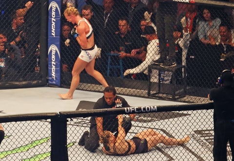 Holly Holm celebrates her victory over Ronda Rousey at UFC 193.