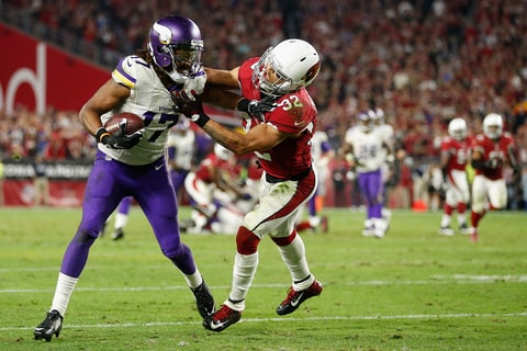 Mathieu tackles Jarius Wrigh of the Minnesota Vikings during a game on December 10, 2015 in Glendale, Arizona.