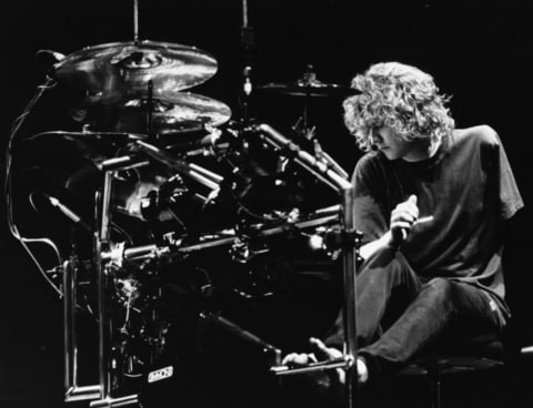 Rick Allen, drummer with the band 'Def Leppard', rehearsing with his modified drum kit to accommodate the loss of his left arm, on stage in Sheffield, England, October 9th 1987.