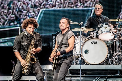 ruce Springsteen, Max Weinberg and Jake Clemons of the E Street Band perform live at San Siro Stadium in Milan, Italy on July 3, 2016, with The River tour.