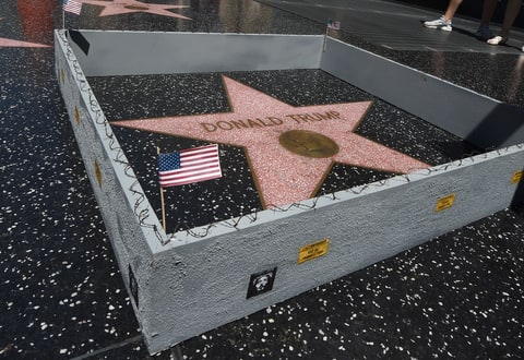 An artist named Plastic Jesus put a wall up around Donald Trump's star on the Hollywood Walk of Fame last summer.