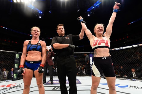 alentina Shevchenko of Kyrgyzstan celebrates after defeating Holly Holm by unanimous decision in their women's bantamweight bout during the UFC Fight Night event at the United Center on July 23, 2016 in Chicago, Illinois.
