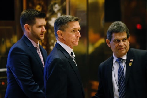 Retired Lt. Gen. Michael Flynn(C) arrives at the Trump Tower for meetings with US President-elect Donald Trump, in New York on November 17, 2016.