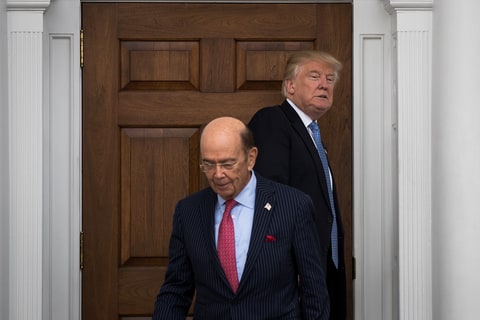 BEDMINSTER TOWNSHIP, NJ - NOVEMBER 20: (L to R) President-elect Donald Trump heads back inside as investor Wilbur Ross leaves following their meeting at Trump International Golf Club, November 20, 2016 in Bedminster Township, New Jersey. Trump and his transition team are in the process of filling cabinet and other high level positions for the new administration.