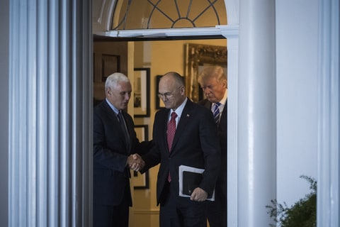 President-elect Donald Trump, Vice President-elect Mike Pence and Andy Puzder, chief executive of CKE Restaurants, walk out at the clubhouse at Trump National Golf Club Bedminster in Bedminster Township, N.J. on Saturday, Nov. 19, 2016.