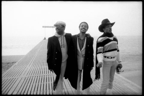 Photo of Charlie WILSON and Robert WILSON and Ronnie WILSON and GAP BAND; L-R: Ronnie Wilson, Robert Wilson, Charlie Wilson on the beach at Cannes, France