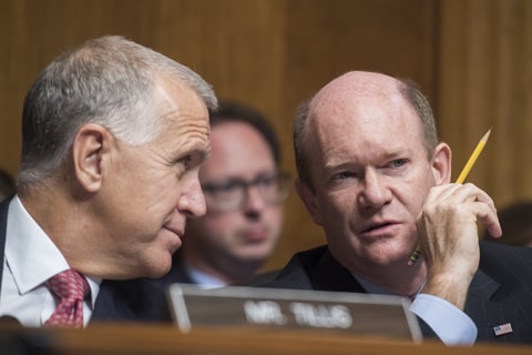 Sens. Thom Tillis, R-N.C., left, and Chris Coons, D-Del., attend a Senate Judiciary Committee hearing titled 'Special Counsels and the Separation of Powers,' on September 26, 2017.