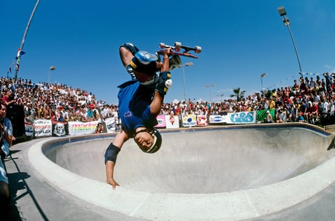 Steve Caballero, riding for Powell Peralta, does an invert above the keyhole pool during competition as the National Skateboarding Association event at the Del Mar Skate Ranch in August 1985 in Del Mar, California.