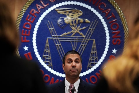 Federal Communications Commission Chairman Ajit Pai listens during a commission meeting December 14, 2017 in Washington, DC. FCC has voted to repeal its net neutrality rules at the meeting.
