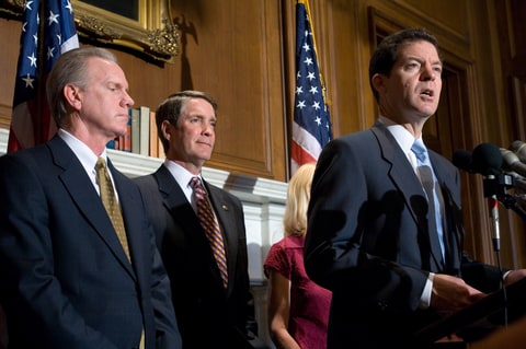 Senator Sam Brownback, right, a Republican from Kansas, addresses the media at a Pro-Life press conference at the U.S. Capitol supporting the ban on fetus farming, Monday, July 17, 2006 in Washington, DC, while Barrett Duke, left, vice president of research and director of the Research Institute of The Ethics & Religious Liberty Commission of the Southern Baptist Convention, and Senator Bill Frist, center, a Republican from Tennessee, look on. The Senate is scheduled to vote on H.R. 810 - the Stem Cell Research Enhancement Act tomorrow.