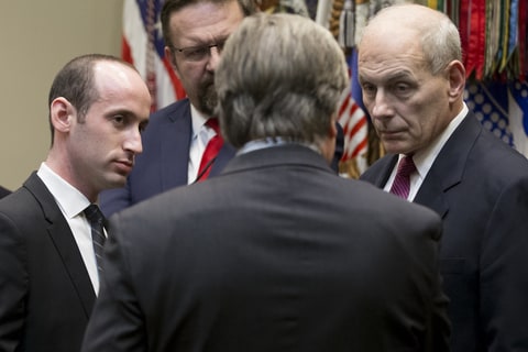 Senior Advisor to the President, Stephen Miller (L) and Secretary of the Department of Homeland Security John Kelly (R) listen to Chief Strategist and Senior Counselor Stephen Bannon (C) before a meeting with US President Donald J. Trump (not pictured) on cyber security in the Roosevelt Room of the White House, in Washington, DC, USA, 31 January 2017.