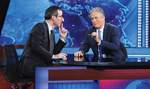 With Jon Stewart on The Daily Show. āIām happy to be in his shadow,ā Oliver says of his mentor.