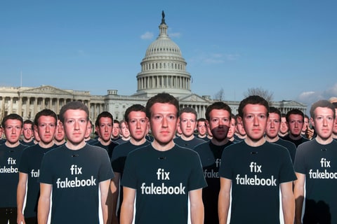 While Mark Zuckerberg prepares to testify before the Senate, 100 cardboard cutouts of the Facebook founder and CEO stand outside the U.S. Capitol in Washington.