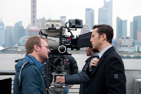 LOOPER, from left: director Rian Johnson, Joseph Gordon-Levitt on set