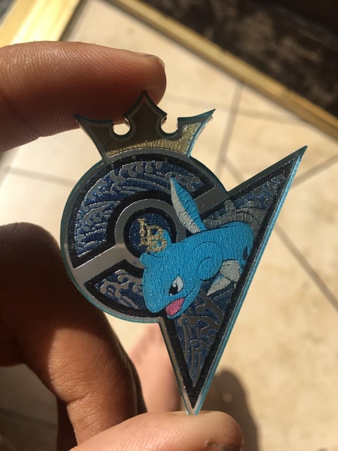 A Pokemon Go badge won by TheOfficialFJR during a tournament