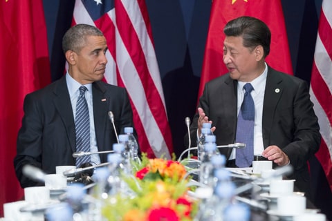 U.S. President Barack Obama, left, meets with Chinese President Xi Jinping on the sidelines of the COP21 United Nations Climate Change Conference in Le Bourget, outside Paris, Monday, Nov. 30, 2015