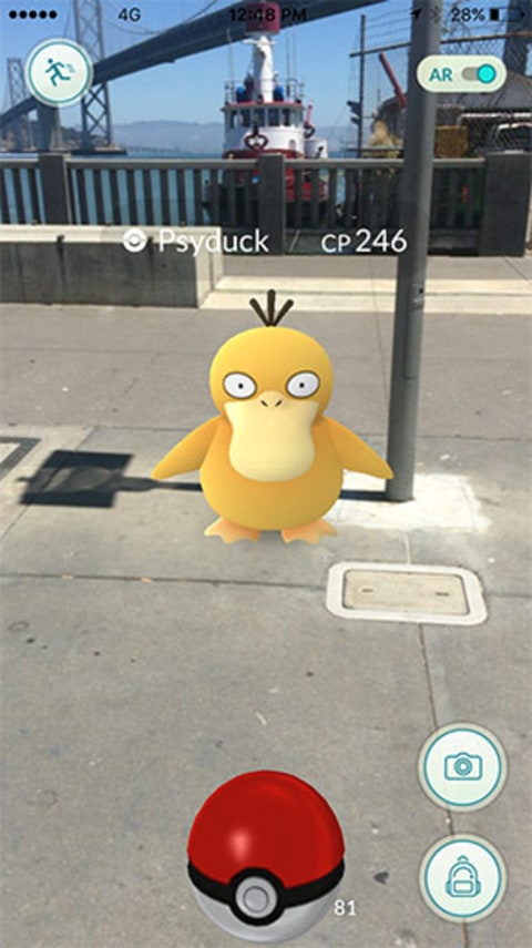 Psyduck as seen through the augmented reality of Pokemon Go on a smartphone