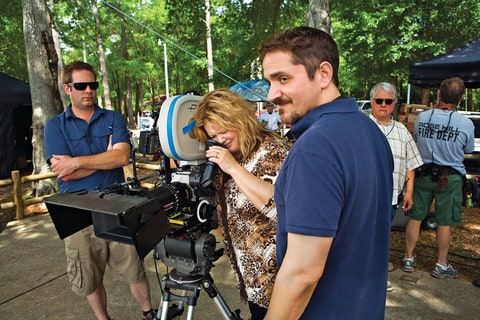 McCarthy on the set of 'Tammy' with her husband - the film's director - Ben Falcone (right).