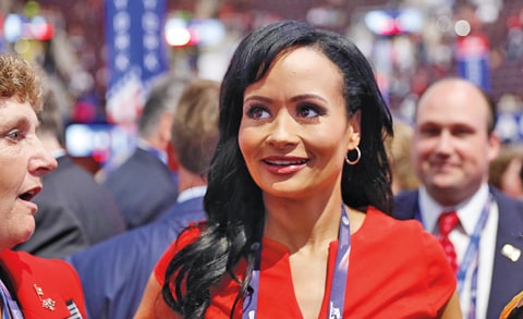 Republican Presidential Candidate Donald Trump spokeswoman Katrina Pierson talks with delegates on the convention floor during the final day of the Republican National Convention in Cleveland, Thursday, July 21, 2016.