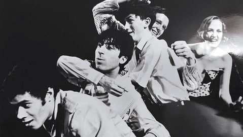 As a young comedian (center) with the Cambridge Footlights in 1998.