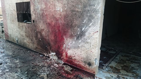 The scene of a suicide bomb at the house where Belden, Chapman and Mørck stayed.