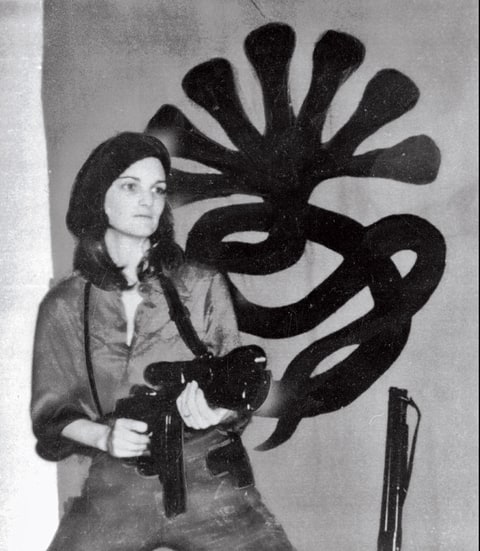 Hearst after her abduction in a photo released by Symbionese Liberation Army.