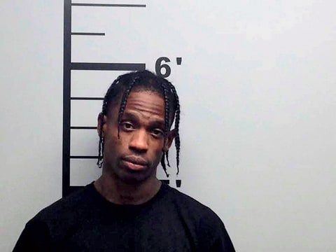 travis scott mug shot arrest riot