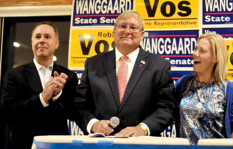 Van Wanggaard talks with supporters Tuesday, Aug. 12, 2014, as Speaker of the Assembly Robin Vos, and state Rep. Samantha Kerkman congratulate him during an election night party in Dover, Wis. Wanggaard, of Racine, was running against Jonathan Steitz in the Republican primary for the seat being vacated by John Lehman.