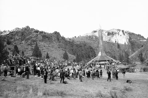 Followers of the Bhagwan Shree Rajneesh gathered at the sect's crematorium on in Rajneeshpuram to burn books and celebrate the end of Rajneeshism, 1985.