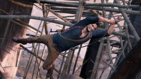 Nathan Drake swinging Uncharted 4